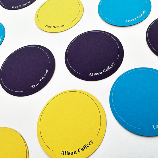 Colorful circle placecards at LCI Paper