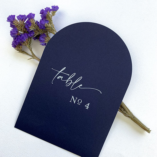 Navy blue table number cards printed in white by LCI Paper