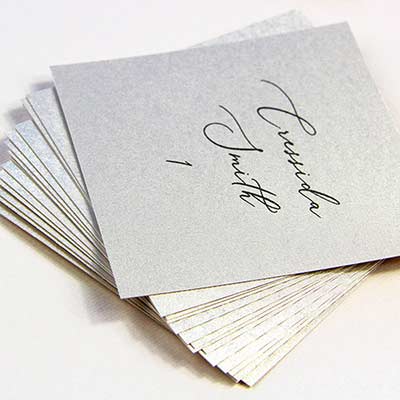 Close up of Colors Metallic cardstock texture. Square, flat, metallic place card shown here.