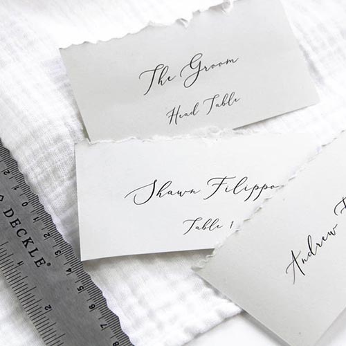 Hand deckled flat place cards. Print and cut at home using printable place card template.