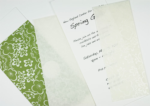 invitations wrapped in decorative pearlized paper