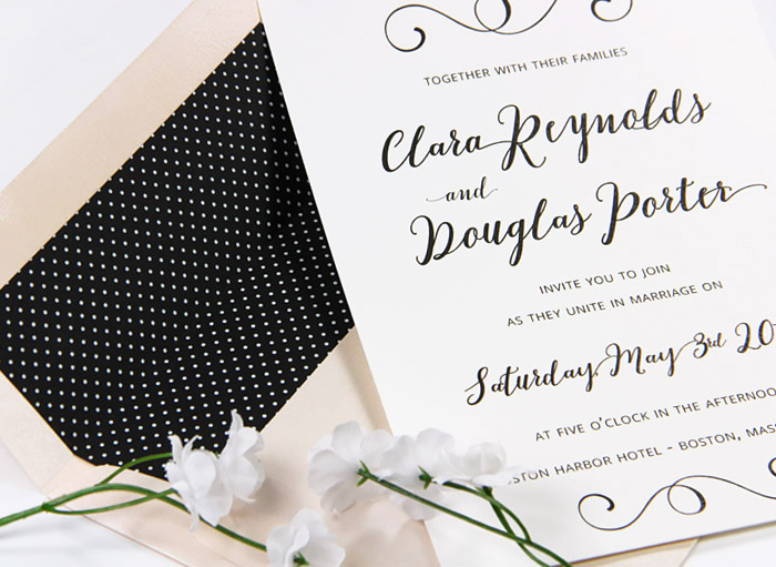 Simple black and white wedding invite with custom printed polka dot envelope liner from LCIPaper.com