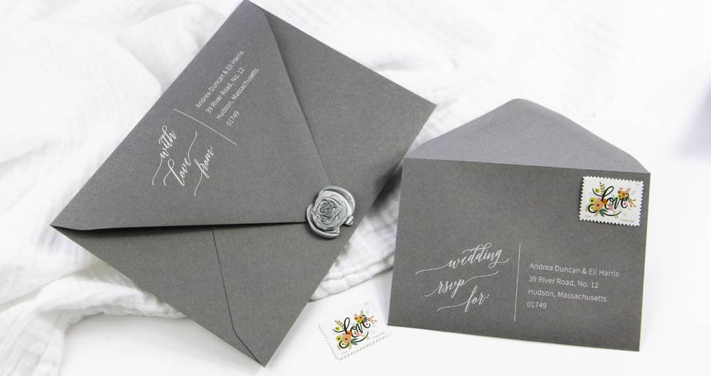 Gray envelopes printed in white ink from LCI Paper. Download free wedding calligraphy return address template, customize in word. Print on your choice of envelopes.