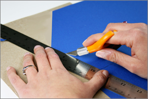 cut pointed portions of pocketfold with exacto knife and ruler straight edge