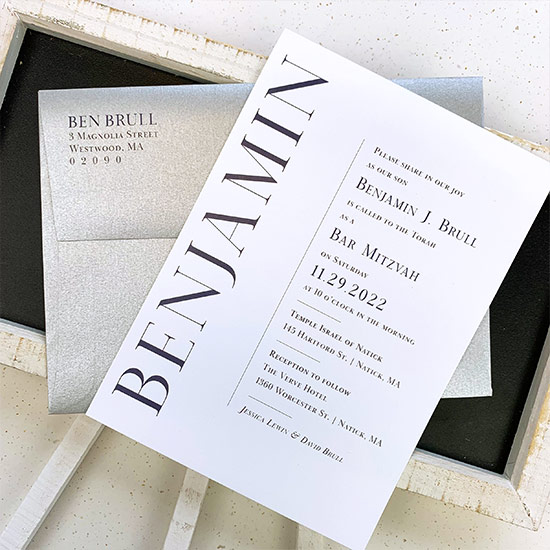 Classic blue and gray Bar Mitzvah invitation with shimmery silver envelope printed by LCI Paper
