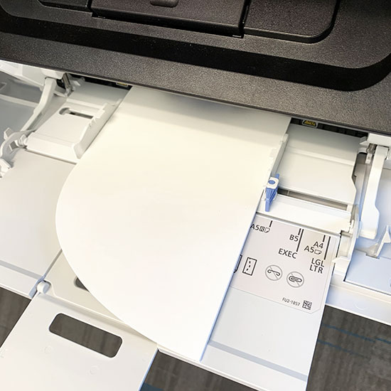 To print your own arch invitations, load them into your printer flat side first