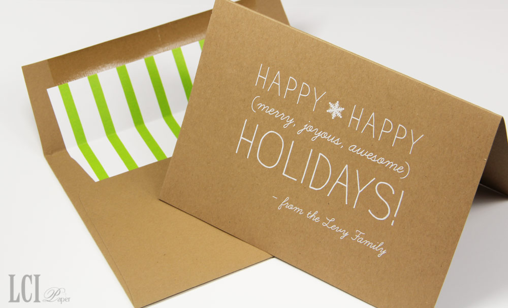 kraft and white holiday card with kiwi striped envelope liner