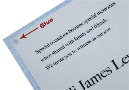 clear vellum adhered to a blue invitation card with glue