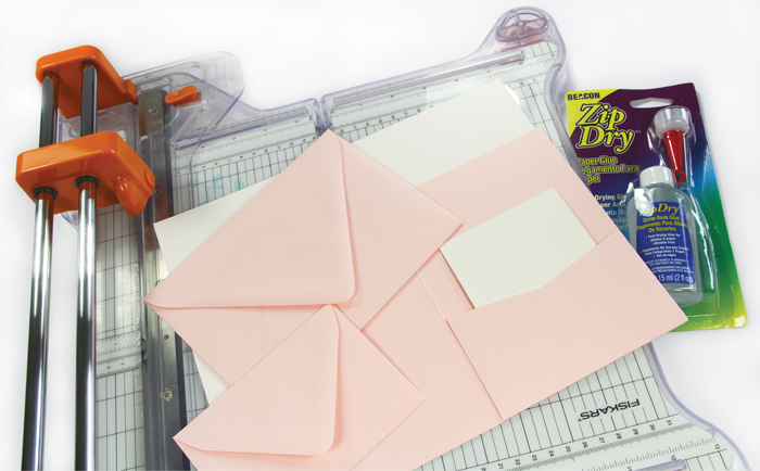materials to make your own pink watercolor pocket invitation
